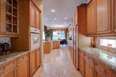 Welcome to a rare former model home in the coveted Manchester on Wycliffe Golf and Country Club in Florida - for sale on GolfHomes.com, golf home, golf lot