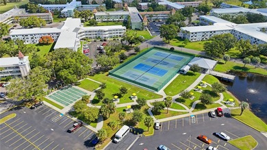 Welcome to this light and bright two-bedroom, two-bathroom condo on On Top Of The World Golf Course in Florida - for sale on GolfHomes.com, golf home, golf lot