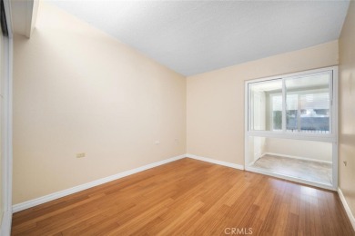 Nestled behind mature trees, this charming home offers a serene on Leisure World Seal Beach Golf Course in California - for sale on GolfHomes.com, golf home, golf lot