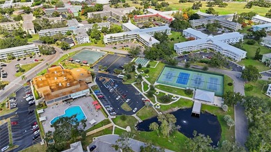 Welcome to this light and bright two-bedroom, two-bathroom condo on On Top Of The World Golf Course in Florida - for sale on GolfHomes.com, golf home, golf lot