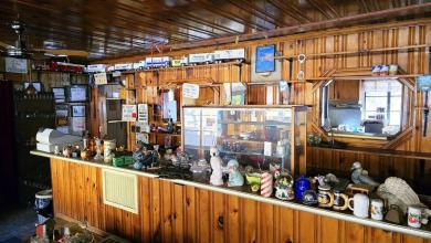 Large multi-purpose fixer-upper building in the heart of the on Twin Falls Resort State Park in West Virginia - for sale on GolfHomes.com, golf home, golf lot