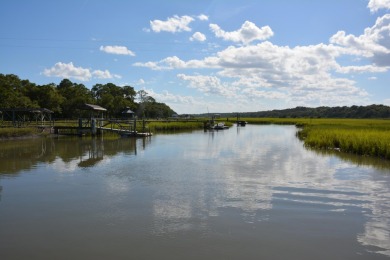 Best of the best! Rare creek front with dock on one side and on The Plantation Course At Edisto in South Carolina - for sale on GolfHomes.com, golf home, golf lot