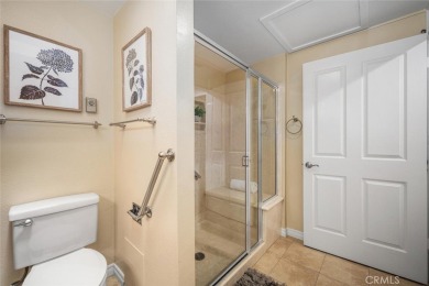 Nestled behind mature trees, this charming home offers a serene on Leisure World Seal Beach Golf Course in California - for sale on GolfHomes.com, golf home, golf lot