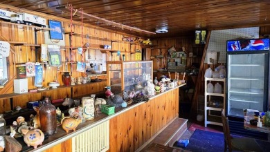 Large multi-purpose fixer-upper building in the heart of the on Twin Falls Resort State Park in West Virginia - for sale on GolfHomes.com, golf home, golf lot