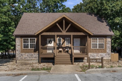 Tucked within the scenic Stonebridge Golf Village, this cozy on Ledgestone Country Club and Golf Course in Missouri - for sale on GolfHomes.com, golf home, golf lot