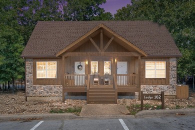 Tucked within the scenic Stonebridge Golf Village, this cozy on Ledgestone Country Club and Golf Course in Missouri - for sale on GolfHomes.com, golf home, golf lot