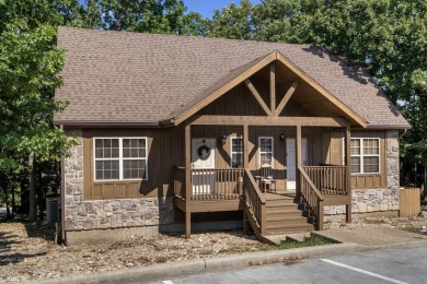 Tucked within the scenic Stonebridge Golf Village, this cozy on Ledgestone Country Club and Golf Course in Missouri - for sale on GolfHomes.com, golf home, golf lot