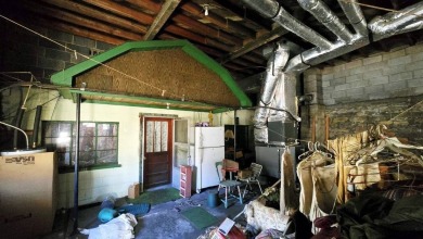 Large multi-purpose fixer-upper building in the heart of the on Twin Falls Resort State Park in West Virginia - for sale on GolfHomes.com, golf home, golf lot