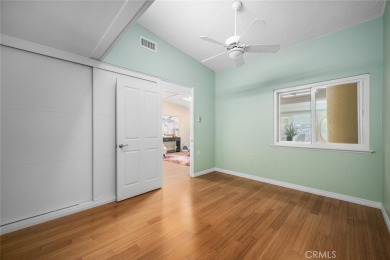 Nestled behind mature trees, this charming home offers a serene on Leisure World Seal Beach Golf Course in California - for sale on GolfHomes.com, golf home, golf lot