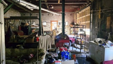 Large multi-purpose fixer-upper building in the heart of the on Twin Falls Resort State Park in West Virginia - for sale on GolfHomes.com, golf home, golf lot