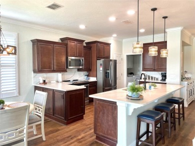 This beautiful 3 bedroom, 2 bathroom lake lot home is located in on Stone Creek Golf Club in Florida - for sale on GolfHomes.com, golf home, golf lot
