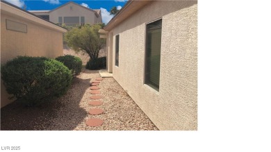 Welcome to this beautifully maintained single-story home in the on Desert Willow Golf Course in Nevada - for sale on GolfHomes.com, golf home, golf lot