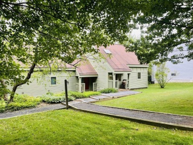 Spacious end unit townhouse overlooking the 1st Fairway at The on Hermitage Club Golf Course in Vermont - for sale on GolfHomes.com, golf home, golf lot