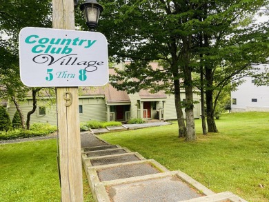 Spacious end unit townhouse overlooking the 1st Fairway at The on Hermitage Club Golf Course in Vermont - for sale on GolfHomes.com, golf home, golf lot