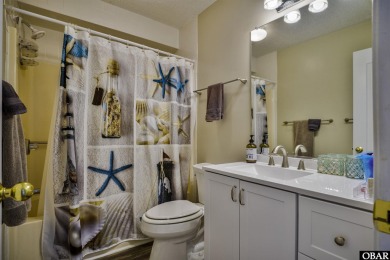 Enjoy coastal living in this 3-bedroom, 2-bath home in the on Nags Head Golf Links in North Carolina - for sale on GolfHomes.com, golf home, golf lot