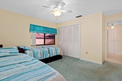 Discover the charm of the Huntingwood neighborhood, nestled in on The Meadows Golf and Country Club in Florida - for sale on GolfHomes.com, golf home, golf lot