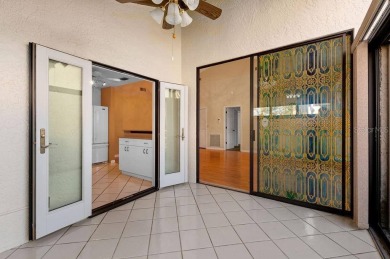 Discover the charm of the Huntingwood neighborhood, nestled in on The Meadows Golf and Country Club in Florida - for sale on GolfHomes.com, golf home, golf lot