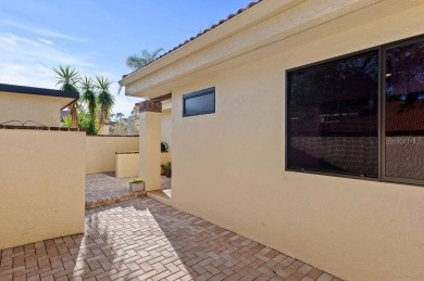 Discover the charm of the Huntingwood neighborhood, nestled in on The Meadows Golf and Country Club in Florida - for sale on GolfHomes.com, golf home, golf lot