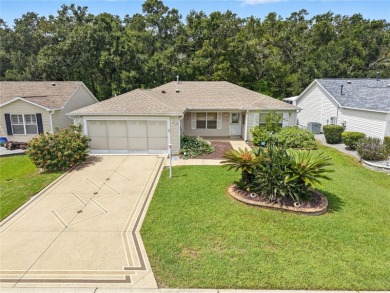 BOND PAID!!! This beautifully maintained 3 bedroom, 3 bathroom on Nancy Lopez Legacy Golf and Country Club in Florida - for sale on GolfHomes.com, golf home, golf lot