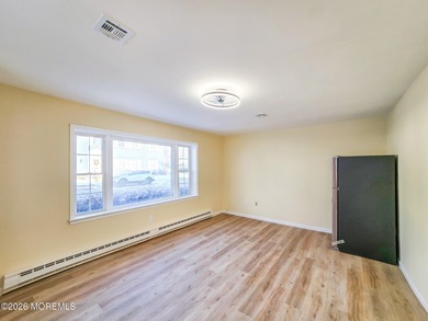 Beautifully renovated 2-bedroom, 1.5-bath ranch with carport on Rossmoor Golf Club in New Jersey - for sale on GolfHomes.com, golf home, golf lot