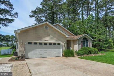 Nestled in the heart of the picturesque Captains Cove community on Captains Cove Golf and Yacht Club in Virginia - for sale on GolfHomes.com, golf home, golf lot