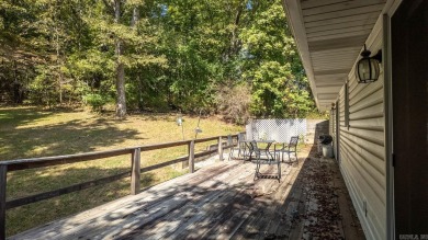 This well-cared-for 3-bedroom, 3-bath home offers comfort and on Cherokee Village North Course in Arkansas - for sale on GolfHomes.com, golf home, golf lot
