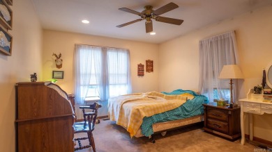 This well-cared-for 3-bedroom, 3-bath home offers comfort and on Cherokee Village North Course in Arkansas - for sale on GolfHomes.com, golf home, golf lot