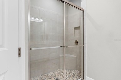 This beautifully appointed Ibis villa offers an exceptional on Esplanade Golf and Country at Lakewood Ranch in Florida - for sale on GolfHomes.com, golf home, golf lot