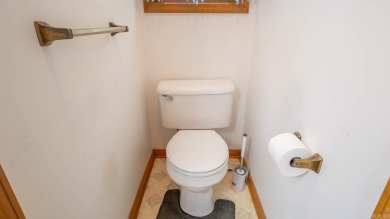 This well-cared-for 3-bedroom, 3-bath home offers comfort and on Cherokee Village North Course in Arkansas - for sale on GolfHomes.com, golf home, golf lot