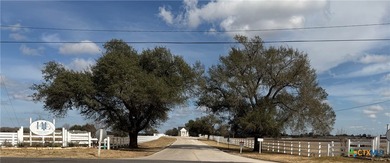Million-dollar panoramic views await from this stunning modern on Hilltop Lakes Resort Golf Club in Texas - for sale on GolfHomes.com, golf home, golf lot