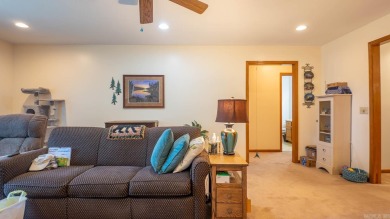This well-cared-for 3-bedroom, 3-bath home offers comfort and on Cherokee Village North Course in Arkansas - for sale on GolfHomes.com, golf home, golf lot
