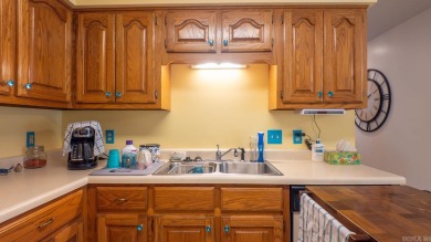This well-cared-for 3-bedroom, 3-bath home offers comfort and on Cherokee Village North Course in Arkansas - for sale on GolfHomes.com, golf home, golf lot