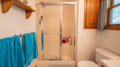 This well-cared-for 3-bedroom, 3-bath home offers comfort and on Cherokee Village North Course in Arkansas - for sale on GolfHomes.com, golf home, golf lot