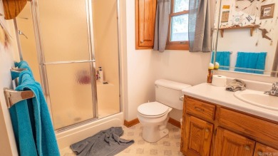This well-cared-for 3-bedroom, 3-bath home offers comfort and on Cherokee Village North Course in Arkansas - for sale on GolfHomes.com, golf home, golf lot