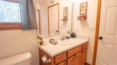 This well-cared-for 3-bedroom, 3-bath home offers comfort and on Cherokee Village North Course in Arkansas - for sale on GolfHomes.com, golf home, golf lot