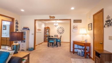 This well-cared-for 3-bedroom, 3-bath home offers comfort and on Cherokee Village North Course in Arkansas - for sale on GolfHomes.com, golf home, golf lot