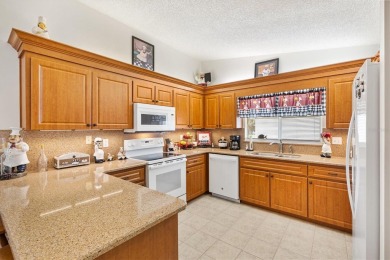 Welcome to the good life in the Beautiful, fun-filled 55+ Gated on The Links of Spruce Creek in Florida - for sale on GolfHomes.com, golf home, golf lot