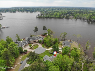 Custom built brick home located on a cul-de-sac lot that offers on Sound Golf Links at Albemarle Plantation in North Carolina - for sale on GolfHomes.com, golf home, golf lot