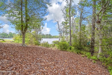 Custom built brick home located on a cul-de-sac lot that offers on Sound Golf Links at Albemarle Plantation in North Carolina - for sale on GolfHomes.com, golf home, golf lot