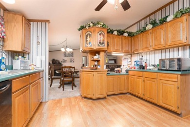 This stunning 3-bedroom, 2-bathroom double-wide home sits on a 2 on Panther Creek Golf Course in Kentucky - for sale on GolfHomes.com, golf home, golf lot