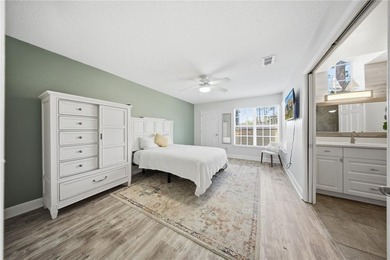 Located in gated Barclay Place, this end unit condominium offers on Heathrow Country Club in Florida - for sale on GolfHomes.com, golf home, golf lot