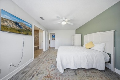 Located in gated Barclay Place, this end unit condominium offers on Heathrow Country Club in Florida - for sale on GolfHomes.com, golf home, golf lot