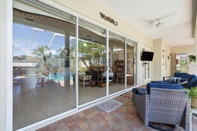 Beautifully updated 1994 Palmwood Bahama Breeze courtyard pool on Glen Lakes Country Club in Florida - for sale on GolfHomes.com, golf home, golf lot