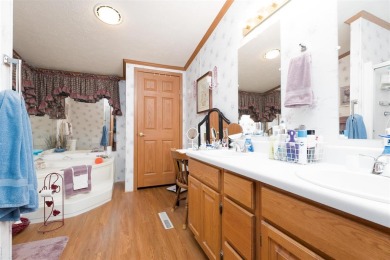 This stunning 3-bedroom, 2-bathroom double-wide home sits on a 2 on Panther Creek Golf Course in Kentucky - for sale on GolfHomes.com, golf home, golf lot