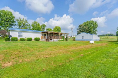 This stunning 3-bedroom, 2-bathroom double-wide home sits on a 2 on Panther Creek Golf Course in Kentucky - for sale on GolfHomes.com, golf home, golf lot