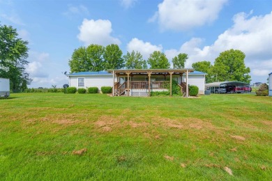 This stunning 3-bedroom, 2-bathroom double-wide home sits on a 2 on Panther Creek Golf Course in Kentucky - for sale on GolfHomes.com, golf home, golf lot