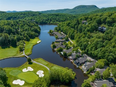 Welcome to this stunning, completely remodeled home that sets on Wildcat Cliffs Country Club in North Carolina - for sale on GolfHomes.com, golf home, golf lot