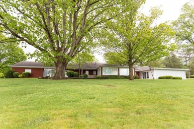 Sprawling 3 bed 3 bath brick ranch with golf course views! on Uniontown Country Club in Pennsylvania - for sale on GolfHomes.com, golf home, golf lot