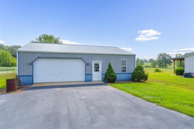 This stunning 3-bedroom, 2-bathroom double-wide home sits on a 2 on Panther Creek Golf Course in Kentucky - for sale on GolfHomes.com, golf home, golf lot