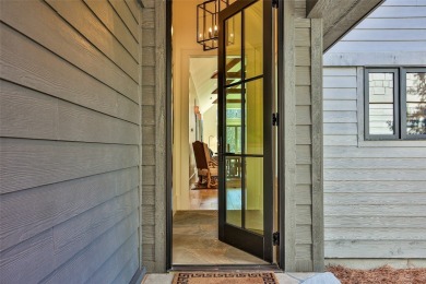 Welcome to this stunning, completely remodeled home that sets on Wildcat Cliffs Country Club in North Carolina - for sale on GolfHomes.com, golf home, golf lot